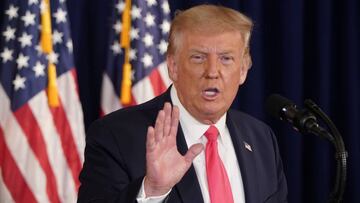 Donald Trump speaks after signing executive orders for economic relief during a news conference at his golf resort in Bedminster, New Jersey.