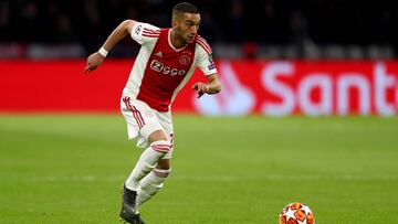 AMSTERDAM, NETHERLANDS - APRIL 10: Hakim Ziyech of Amsterdam runs with the ball during the UEFA Champions League Quarter Final first leg match between Ajax and Juventus at Johan Cruyff Arena on April 10, 2019 in Amsterdam, Netherlands. (Photo by Lars Baro