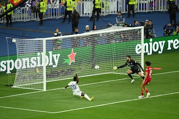 Vinicius Jr of Real Madrid scores the only goal during the 2022 UEFA Champions League final.