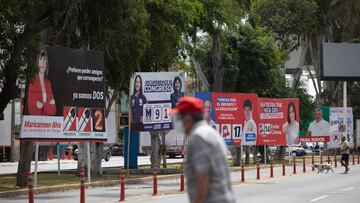 LIMA, PERU - APRIL 09: A view in a lima stree full of electoral advertisement in a Lima street days before the presidential election on April 9, 2021 in Lima, Peru. Peruvians will vote on Sunday 11 amid surge in cases of COVID-19 and deaths to elect the successor of interim president Francisco Sagasti. (Photo by Angela Ponce/Getty Images)