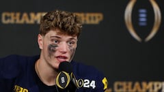 HOUSTON, TEXAS - JANUARY 08: J.J. McCarthy #9 of the Michigan Wolverines answers questions during the press conference after defeating the Washington Huskies during the 2024 CFP National Championship game at NRG Stadium on January 08, 2024 in Houston, Texas. Michigan defeated Washington 34-13.   Maddie Meyer/Getty Images/AFP (Photo by Maddie Meyer / GETTY IMAGES NORTH AMERICA / Getty Images via AFP)