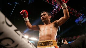 Manny Pacquiao celebrates after defeating Timothy Bradley Jr. by unanimous decision in their welterweight championship fight on April 9, 2016 at MGM Grand Garden Arena in Las Vegas, Nevada.