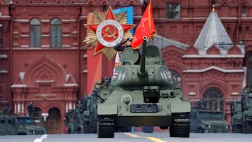 A Russian service member is seen atop a T-34 Soviet-era tank that drives along Red Square during a rehearsal for a military parade, which marks the anniversary of the victory over Nazi Germany in World War Two, in central Moscow, Russia, May 5, 2024. REUTERS/Maxim Shemetov