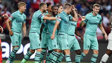 SINGAPORE - JULY 28: Arsenal player celebrates during the International Champions Cup match between Arsenal and Paris Saint Germain at the National Stadium on July 28, 2018 in Singapore. (Photo by Thananuwat Srirasant/Getty Images for ICC)