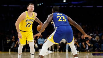 Luka Doncic y Draymond Green -