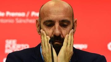 Sevilla's Sports director Ramon Rodriguez Verdejo aka Monchi gestures during a press conference held to announce that he will leave the Sevilla FC, at the Ramon Sanchez Pizjuan stadium in Sevilla on March 31, 2017.
Sevilla said on March 30, 2017 that highly respected sporting director Ramon Rodriguez Verdejo, better known as "Monchi", was leaving the club after guiding it through its most successful era. / AFP PHOTO / CRISTINA QUICLER
