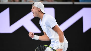 Denmark's Holger Rune reacts on a point against Serbia's Miomir Kecmanovic during their men's singles match on day seven of the Australian Open tennis tournament in Melbourne on January 18, 2025. (Photo by Yuichi YAMAZAKI / AFP) / -- IMAGE RESTRICTED TO EDITORIAL USE - STRICTLY NO COMMERCIAL USE --
