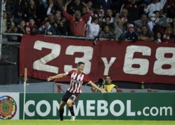 Argentina's Estudiantes de La Plata's forward Guido Carrillo celebrates after scoring the team's second goal against Colombia's Independiente Santa Fe during the Copa Libertadores 2015 round before the quarterfinals first leg football match at Ciudad de La Plata stadium in La Plata, Buenos Aires, Argentina, on May 5, 2015. AFP PHOTO / Juan Mabromata