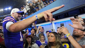 INGLEWOOD, CALIFORNIA - SEPTEMBER 08: Josh Allen #17 of the Buffalo Bills celebrates with fans after a 31-10 win over the Los Angeles Dodgers at SoFi Stadium on September 08, 2022 in Inglewood, California.   Kevork Djansezian/Getty Images/AFP