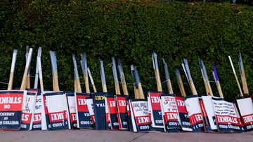 FILE PHOTO: Strike signs await striking SAG-AFTRA actors and Writers Guild of America (WGA) outside Disney Studios in Burbank, California, U.S., July 25, 2023. REUTERS/Mike Blake/File Photo/File Photo