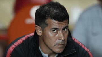 Jorge Almiron, coach of Argentina's San Lorenzo, looks on before a Copa Libertadores Group F soccer match against Peru's Melgar in Buenos Aires, Argentina, Tuesday, April 9, 2019. (AP Photo/Gustavo Garello)