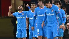 Atletico Madrid&#039;s Brazilian defender Renan Lodi (L) celebrates after scoring the opening goal of the UEFA Champions League round of 16 second leg football match between Manchester United and Atletico Madrid at Old Trafford stadium in Manchester, nort