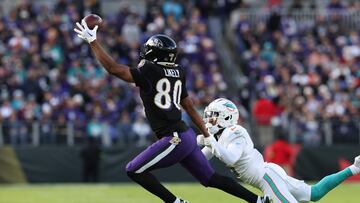 BALTIMORE, MARYLAND - DECEMBER 31: Isaiah Likely #80 of the Baltimore Ravens catches a pass for a touchdown against the Miami Dolphins during the second quarter of the game at M&T Bank Stadium on December 31, 2023 in Baltimore, Maryland. Todd Olszewski/Getty Images/AFP (Photo by Todd Olszewski / GETTY IMAGES NORTH AMERICA / Getty Images via AFP)