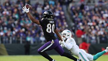 BALTIMORE, MARYLAND - DECEMBER 31: Isaiah Likely #80 of the Baltimore Ravens catches a pass for a touchdown against the Miami Dolphins during the second quarter of the game at M&T Bank Stadium on December 31, 2023 in Baltimore, Maryland.   Todd Olszewski/Getty Images/AFP (Photo by Todd Olszewski / GETTY IMAGES NORTH AMERICA / Getty Images via AFP)