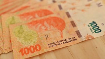 Argentine pesos bills are seen in Buenos Aires on January 12, 2023. - Argentina registered inflation of 94.8 percent in 2022, its highest annual figure since 1991, the Indec national statistics institute said on Thursday. (Photo by Luis ROBAYO / AFP) (Photo by LUIS ROBAYO/AFP via Getty Images)