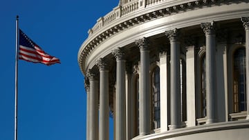 FILE PHOTO: An American flag flies outside of the U.S. Capitol dome in Washington, U.S., January 15, 2020. REUTERS/Tom Brenner/File Photo