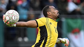 Sudan's goalkeeper #21 Monged Elneel throws the ball during the Africa Cup of Nations (CAN) Group E football match between Algeria and Sudan at Moulay Hassan Stadium in Rabat on December 24, 2025. (Photo by Gabriel BOUYS / AFP)