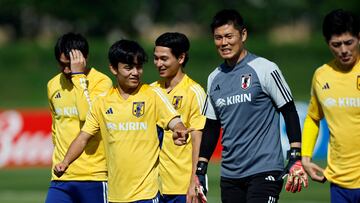 Kubo, junto a Kawashima.
