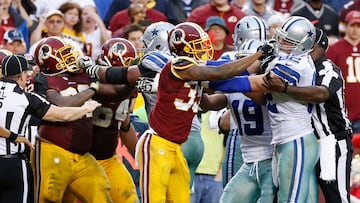Dec 22, 2013; Landover, MD, USA; Washington Redskins and Dallas Cowboys players fight in the final minute of the fourth quarter at FedEx Field. The Cowboys won 24-23. Mandatory Credit: Geoff Burke-USA TODAY Sports