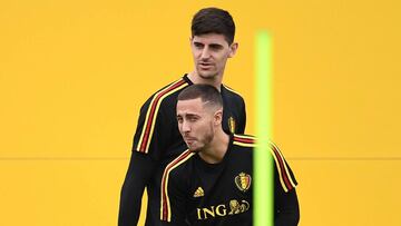 Belgium's goalkeeper Thibaut Courtois (back) and Belgium's forward Eden Hazard attend a training session at the Guchkovo Stadium in Dedovsk, outside Moscow, on July 9, 2018, on the eve of their Russia 2018 World Cup semi-final football match aga