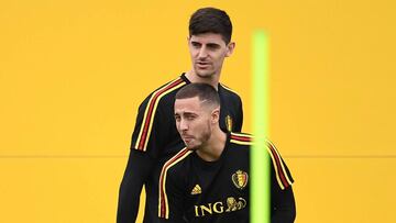 Belgium&#039;s goalkeeper Thibaut Courtois (back) and Belgium&#039;s forward Eden Hazard attend a training session at the Guchkovo Stadium in Dedovsk, outside Moscow, on July 9, 2018, on the eve of their Russia 2018 World Cup semi-final football match aga