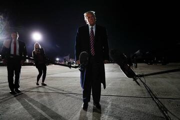 U.S. President Donald Trump reacts after learning of the death of U.S. Supreme Court Justice Ruth Bader Ginsburg, following a campaign event at the Bemidji Regional Airport in Bemidji, Minnesota, U.S., September 18, 2020. REUTERS/Tom Brenner