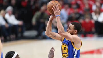 Apr 24, 2017; Portland, OR, USA; Golden State Warriors guard Stephen Curry (30) shoots the ball over Portland Trail Blazers forward Noah Vonleh (21) in game four of the first round of the 2017 NBA Playoffs at Moda Center. Mandatory Credit: Jaime Valdez-USA TODAY Sports