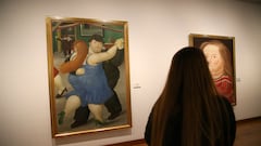 A woman looks at paintings by the artist Fernando Botero, who died in Monaco at the age of 91, at the Botero Museum in Bogota, Colombia September 15, 2023. REUTERS/Luisa Gonzalez       NO RESALES. NO ARCHIVES.