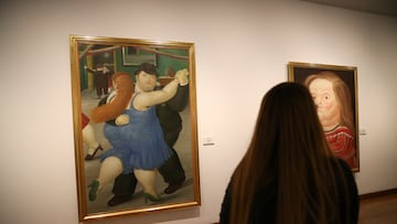 A woman looks at paintings by the artist Fernando Botero, who died in Monaco at the age of 91, at the Botero Museum in Bogota, Colombia September 15, 2023. REUTERS/Luisa Gonzalez       NO RESALES. NO ARCHIVES.