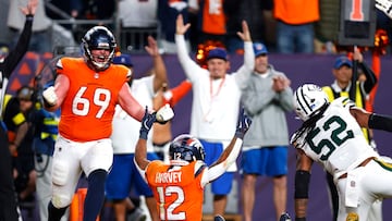 DENVER, COLORADO - DECEMBER 14: RJ Harvey #12 of the Denver Broncos celebrates after scoring a rushing touchdown against the Green Bay Packers during the fourth quarter at Empower Field At Mile High on December 14, 2025 in Denver, Colorado. Justin Edmonds/Getty Images/AFP (Photo by Justin Edmonds / GETTY IMAGES NORTH AMERICA / Getty Images via AFP)
