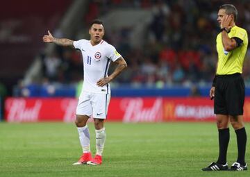 Eduardo Vargas of Chile appeals as referee Damir Skomina listens to his ear piece during the FIFA Confederations Cup Russia 2017