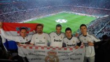 Cinco miembros de la peña, en un partido de Champions en Chamartín.