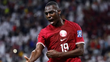 Qatar's forward #19 Almoez Ali celebrates scoring a goal during the 2026 FIFA World Cup AFC qualifiers football match between Qatar and Afghanistan at the Khalifa International Stadium on November 16, 2023. (Photo by KARIM JAAFAR / AFP)