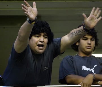 Diego Armando Maradona supporting Boca Juniors at La Bombonera.