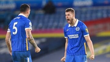 Soccer Football - Premier League - Leeds United v Brighton & Hove Albion - Elland Road, Leeds, Britain - January 16, 2021 Brighton & Hove Albion's Adam Webster celebrates after the match with Lewis Dunk Pool via REUTERS/Michael Regan EDITORIA