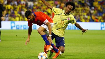 Soccer Football - International Friendly - Chile v Colombia - Estadio Jose Rico Perez, Alicante, Spain - October 12, 2019  Chile&#039;s Alexis Sanchez in action with Colombia&#039;s Juan Cuadrado  REUTERS/Javier Barbancho