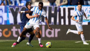 LEGANES, SPAIN - MARCH 18: Seydouba Cisse of CD Leganes is challenged by Luismi Sanchez of Real Oviedo during the La Liga SmartBank match between CD Leganes and Real Oviedo at Estadio Municipal de Butarque on March 18, 2023 in Leganes, Spain. (Photo by Angel Martinez/Getty Images)