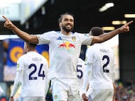 Leeds United's English striker #09 Dominic Calvert-Lewin celebrates after scoring their third goal from the penalty spot during the English Premier League football match between Leeds United and Wolverhampton Wanderers at Elland Road in Leeds, northern England on April 18, 2026. (Photo by Darren Staples / AFP) / RESTRICTED TO EDITORIAL USE. No use with unauthorized audio, video, data, fixture lists, club/league logos or 'live' services. Online in-match use limited to 120 images. An additional 40 images may be used in extra time. No video emulation. Social media in-match use limited to 120 images. An additional 40 images may be used in extra time. No use in betting publications, games or single club/league/player publications. /