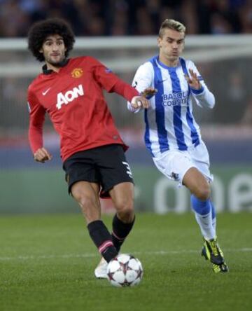 Griezmann y Fellaini.