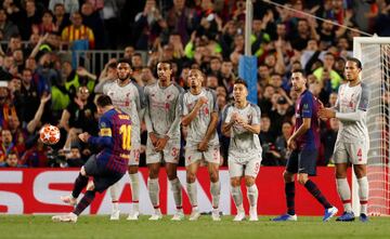 Barcelona's Lionel Messi scores from the free kick to make it 3-0.