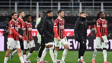 Ac Milan's players leaves the pitch at the end of the Italian Serie A football match between AC Milan and Juventus Turin at San Siro stadium in Milan, on November 23, 2024. (Photo by Isabella BONOTTO / AFP)