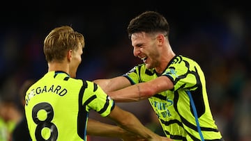 Soccer Football - Premier League - Crystal Palace v Arsenal - Selhurst Park, London, Britain - August 21, 2023 Arsenal's Declan Rice celebrates with Martin Odegaard after the match Action Images via Reuters/Andrew Boyers EDITORIAL USE ONLY. No use with unauthorized audio, video, data, fixture lists, club/league logos or 'live' services. Online in-match use limited to 75 images, no video emulation. No use in betting, games or single club /league/player publications.  Please contact your account representative for further details.