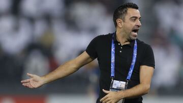 Sadd SC's Spanish coach Xavi Hernandez reacts during the AFC Champions League quarter-final football match between Saudi's Al-Nassr and Qatar's Al-Sadd at the Jassim bin Hamad Stadium in Doha on September 16, 2019. (Photo by KARIM JAAFAR /