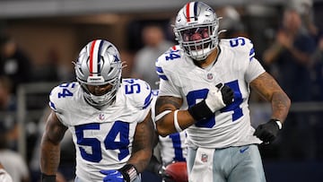 Nov 3, 2025; Arlington, Texas, USA; Dallas Cowboys defensive end Marshawn Kneeland (94) celebrates with defensive end Sam Williams (54) after recovering a blocked punt for a touchdown against the Arizona Cardinals in the first half at AT&T Stadium. Mandatory Credit: Jerome Miron-Imagn Images