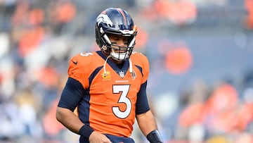 (FILES) Russell Wilson #3 of the Denver Broncos warms up prior to a game against the Los Angeles Chargers at Empower Field At Mile High on December 31, 2023 in Denver, Colorado. The Denver Broncos said March 4, the team has released veteran quarterback Russell Wilson, drawing a line under one of the most calamitous deals in NFL history.
In a statement, the Broncos confirmed Wilson's departure just two years after the former Seattle Seahawks star joined the club in a blockbuster trade. (Photo by Dustin Bradford / GETTY IMAGES NORTH AMERICA / AFP)