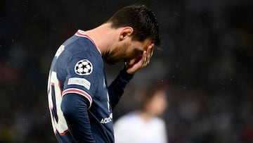 Paris Saint-Germain&#039;s Argentinian forward Lionel Messi reacts during the UEFA Champions League round of 16 first leg football match between Paris Saint-Germain (PSG) and Real Madrid at the Parc des Princes stadium in Paris on February 15, 2022. (Phot