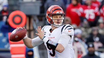 FOXBOROUGH, MASSACHUSETTS - DECEMBER 24: Joe Burrow #9 of the Cincinnati Bengals attempts a pass during the second quarter against the New England Patriots at Gillette Stadium on December 24, 2022 in Foxborough, Massachusetts.   Winslow Townson/Getty Images/AFP (Photo by Winslow Townson / GETTY IMAGES NORTH AMERICA / Getty Images via AFP)