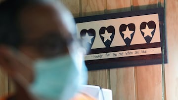 A painting alluding to &quot;The Stars and Stripes Forever,&quot; hangs on the wall of Emanuel Rivera Fuentes, 35, who was born severely disabled and needs constant care, at his home, in Toa Alta, Puerto Rico.