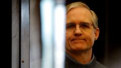 FILE PHOTO: Former U.S. Marine Paul Whelan stands inside a defendants' cage during his verdict hearing in Moscow, Russia June 15, 2020. REUTERS/Maxim Shemetov//File Photo