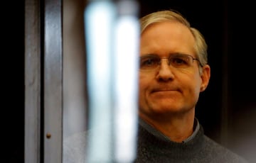 FILE PHOTO: Former U.S. Marine Paul Whelan stands inside a defendants' cage during his verdict hearing in Moscow, Russia June 15, 2020. REUTERS/Maxim Shemetov//File Photo